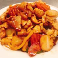 Cashew Delight · Stir-fried Cashew nuts, bell peppers, onion, mushroom, snow pea, and carrot with Thai sweet ...
