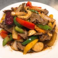 Thai Pepper Steak · Angus beef, stir-fried with bell peppers, onion, mushroom, ground pepper in Thai pepper sauc...