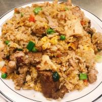 Combination Fried Rice · Fried rice with egg, chicken, shrimp (3), pork, beef, onion, tomato, scallions.