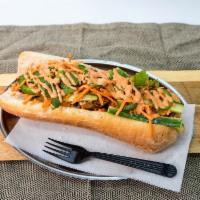 The Jeggy Boy Sandwich · Citrus marinated tofu, pickles carrot, cucumber, cilantro and vegan Sriracha mayo. Vegan.