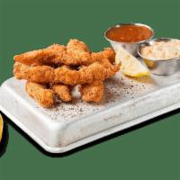 Sweetwater Catfish Fingers Appetizer · Tender strips lightly-breaded with Cajun-seasoned cornmeal and flash-fried. Served with rémo...