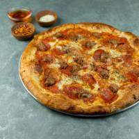Salsiccia Thin Crust Pizza · All-natural garlic-fennel sausage, herbed ricotta, basil, mozzarella and homemade tomato sau...