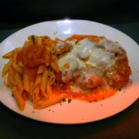 Shrimp Parmigiana · Breaded and baked, topped with mozzarella cheese and marinara sauce, served with penne pasta.