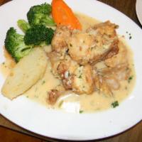 Shrimp Francese · Dipped in egg and sauteed with garlic, shallots, lemon and white wine. Dinners are served wi...