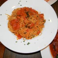 Spaghetti Pomodoro · Basil, garlic and fresh tomatoes. 