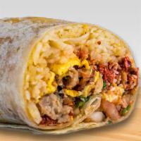 Loaded Breakfast Burrito · Loaded with chorizo, ham, sausage, bacon, eggs, potato, onions, cilantro, hot sauce, tomato,...