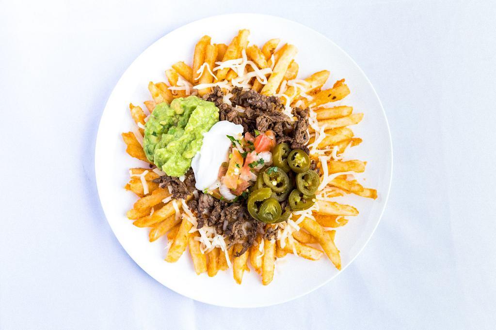 La Villa Fries · Fries, your choice of cheese, your choice of meat, guacamole, pico de gallo, sour cream, and jalapeños.