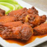 Chicken Wings · Your choice of mild Buffalo wing sauce or BBQ sauce.