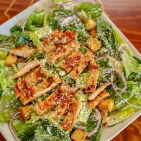 Chicken Caesar Salad · Fresh chopped romaine lettuce, red onions croutons and Parmesan cheese.