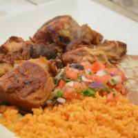 Pork Carnitas Dinner · Tender chunk of pork. Served with rice, refried beans with cheese, pico de gallo and 3 flour...