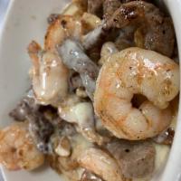 Mar y Tierra Fajita Dinner · Chicken, shrimp, steak strip, all grilled and served with cheese in a bowl. On the side pico...