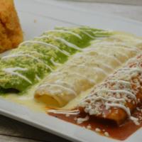 Enchiladas Banderas Dinner · 3 enchiladas, 1 with chicken, 1 with beef and 1 with cheese topped with 3 different sauce. S...