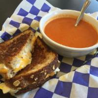 3 cheese Grilled Cheese tomato soup · Served with tomato soup.