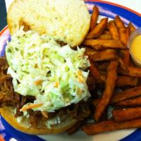 Gonzo Pulled Pork · Slow-smoked pulled pork with our Georgia Barbeque sauce, Brie cheese and coleslaw on a grill...