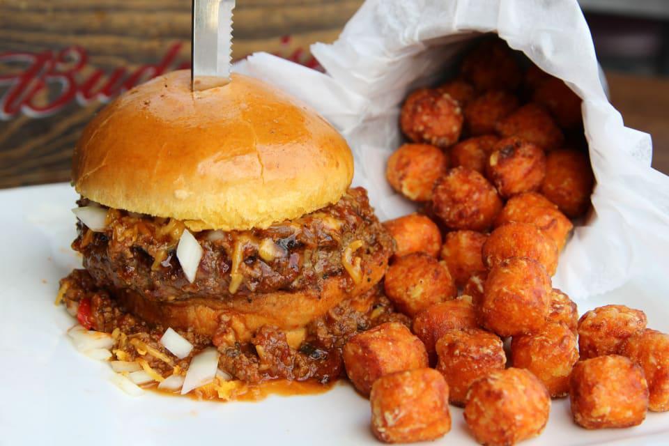 Road House Burger · Beef chili, cheddar and onions. These items may contain raw or undercooked ingredients. Consuming raw or undercooked meat, poultry, seafood, or egg may increase your risk for a foodborne illness. Please consult your physician or public health official for further information.