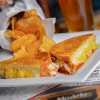 Grilled Cheese Sandwich · American, Swiss, provolone, tomatoes and sourdough. Add bacon, ham, pastrami or turkey for a...