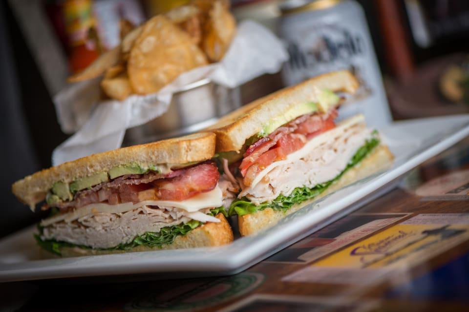 Grayhawk Club Sandwich · Turkey or ham, bacon, Jack, avocado, lettuce, tomatoes, chef's mayo, sourdough or wheat toast.