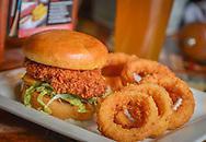 Nashville Hot Chicken Sandwich · Crispy fried chicken breast, buffalo sauce, pickles, lettuce and mayo. Spicy.