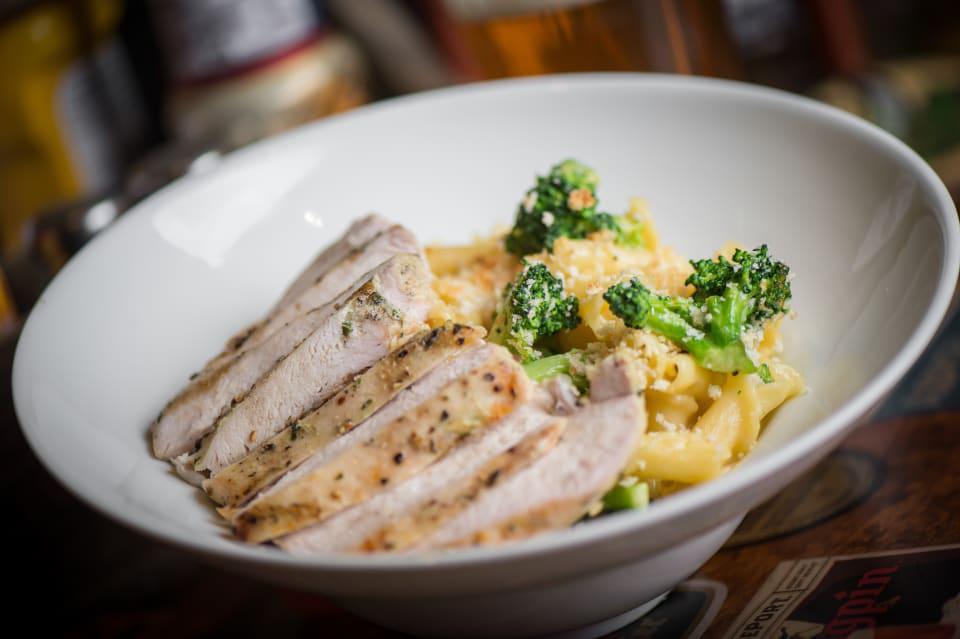Buddha’s Delight · Chicken, cheese blend, Swiss, broccoli and toasted bread crumbs.