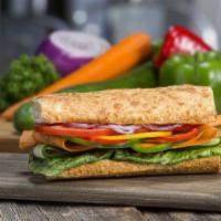 10. Veggie Sandwich · Red, yellow, and green bell pepper, carrots, cucumber, lettuce, tomatoes, onion, avocado, an...