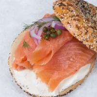 Lox  · on a bagel with smoked salmon onion cream cheese tomato capers 