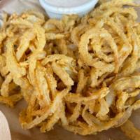Onion Strings · Thinly sliced &  hand battered, served with a side of spicy ranch.	
