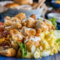 Rainey's Salad · Fried chicken tenders or grilled chicken with greens, bacon, egg, jack & cheddar cheese, tom...