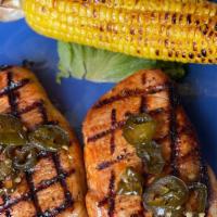Bandera Pork Chops · with roasted corn on the cob, Two pork chops with a sweet & spicy jalapeno glaze (Gluten Fre...