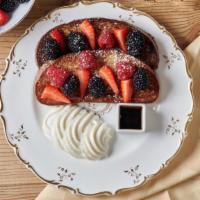 French Toast and Fruits · Homemade brioche bread, whipped cream, fruits and maple syrup.