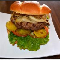 Naked Burger · A basic hand-made beef patty, served with lettuce, tomato, onions, pickle and house sauce.