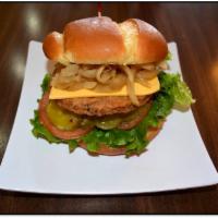 Garden Burger · Veggie patty, served with lettuce, tomato, pickle and house sauce. Add mushrooms, cheese, pi...