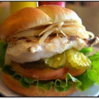 Naked Chicken Sandwich · Grilled chicken breast, served with lettuce, tomato, grilled onions, pickle and house sauce.