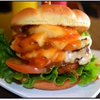 Hawaiian Chicken Sandwich · Grilled pineapple on top of grilled chicken breast. Served with Hawaiian sweet and sour sauc...