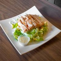 Grilled Salmon Salad · Grilled salmon fillet toss in fresh cut romaine lettuce, tomato and onions.