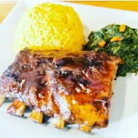Jerk BBQ Ribs · Grilled baby back ribs, marinated in jerk spices, then seasoned with our signature jerk hone...