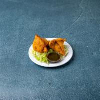 Samosa  · 2 crispy pastries filled with your choice of freshly mixed vegetables or delicately spiced l...