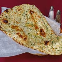 Garlic Naan · Leavened bread topped with garlic.