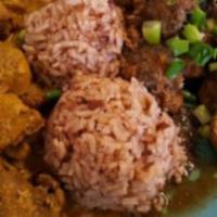 Curry Pork · Served with rice and sweet plantains
