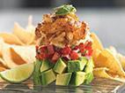 Fresh Avocado and Shrimp Stack · Fresh avocado, pico de gallo, spicy chipotle ranch dressing layered and topped with Cajun gr...