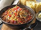 Calendars Famous Chili-Cup · Angus ground beef, tender beans and sweet onions topped with aged cheddar cheese, tortilla strips and pico de gallo.