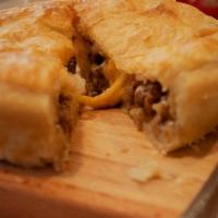 Mince and Cheese Pie · Flaky pastry filled with ground beef, gravy and cheese!