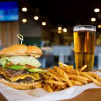 Classic Best Cheeseburger and Fries · Choice Angus beef with tillamook cheddar cheese, grilled onions, lettuce, tomato, 1000 islan...