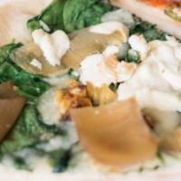 Vegetarian Pizza · Tomato sauce, spinach, caramelized onions, roasted tomatoes, artichoke hearts, provolone and...