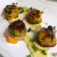 Shrimp Cakes · Four mini-shrimp cakes with spicy wasabi mayo and red onion pickles.