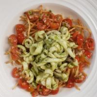 Calamari Al Pesto · Served with cherry tomatoes and onions rings
