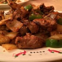 Hunan Spareribs · Marinated pork ribs with bell peppers, onion, garlic, and ginger. Spicy. 