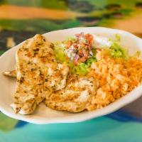 135. Grilled Tilapia · Served with salad, Spanish rice and ranch sauce.