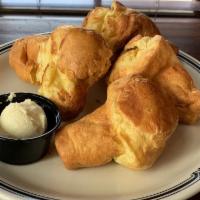 Mini Popovers · 4 homemade mini popovers with honey butter.