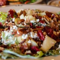 Cranberry Apple Chopped · Romaine, cranberries, apple slices, bacon, goat cheese, spiced candied pecans, and poppyseed...