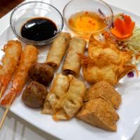10. Party combo · Served with spring rolls 2 pieces, crab puffs 2 pieces, coconut prawns 2 pieces, pot sticker...